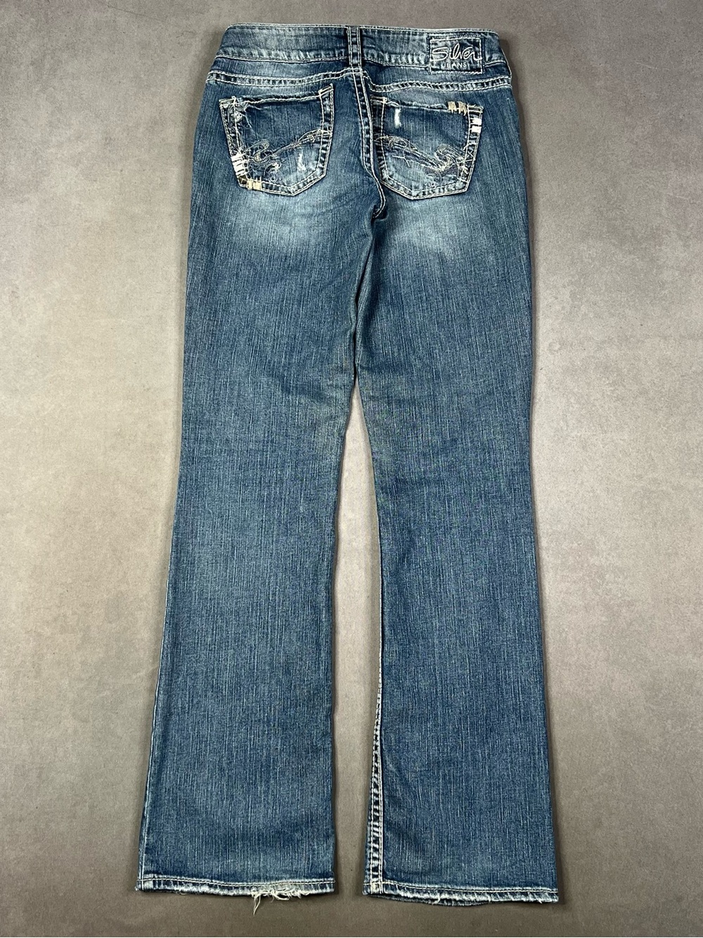 Silver Jeans Women's Blue Bootcut Denim Jeans with Distressed Back Pockets